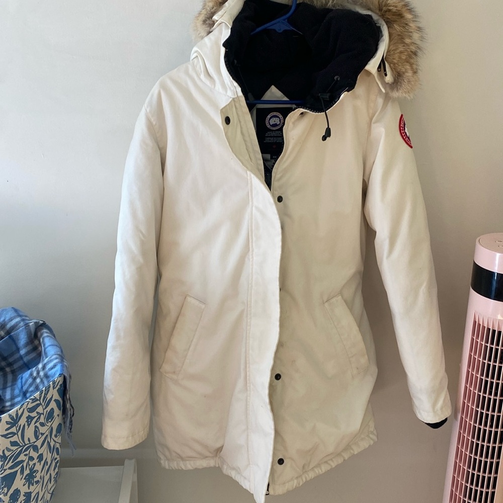 - Canada Goose Victoria White Women’s Medium. Used.  Some stains near wrists.